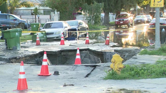 Large sinkhole caused by water main break in South Los Angeles