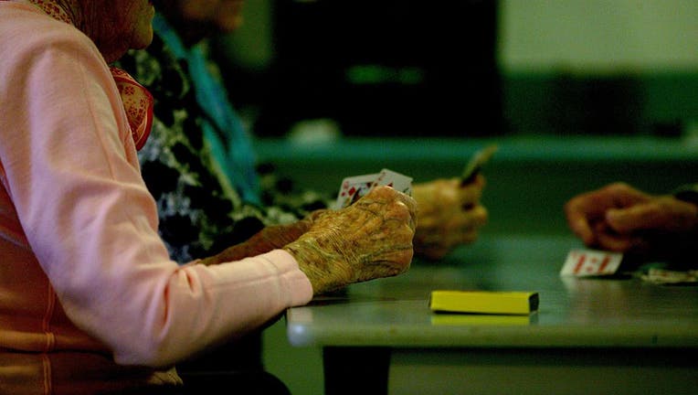 73d0d03c-Generic picture of elderly people playing cards in a nursing home, 25 May 2004.