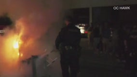 Two taken into custody at UCLA for setting fires after loss in national semifinal game of the NCAA