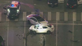 Driver in custody after refusing to get out of car after chase, crashing suspected stolen car in Beverly Hills