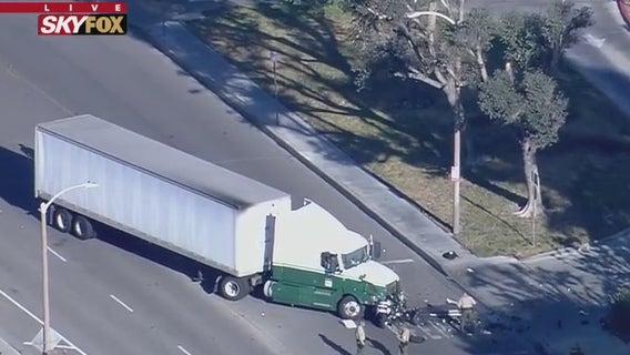 Motorcycle deputy injured in crash involving semi-truck in Valencia