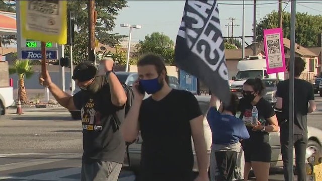 Demonstrators show unity at Florence and Normandie after Chauvin guilty verdict
