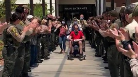 Sheriff's department cheers as motor deputy injured in crash is released from hospital