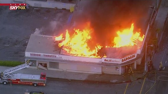 Crews battle two-alarm commercial building fire in Compton