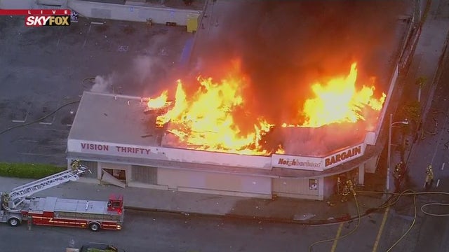 Crews battle two-alarm commercial building fire in Compton