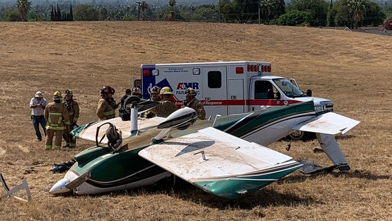 Plane crashes onto airport property in Riverside; 2 injured