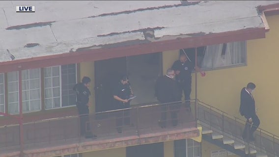 LAPD officers fatally shoot suspect holding elderly woman at knifepoint inside West LA apartment