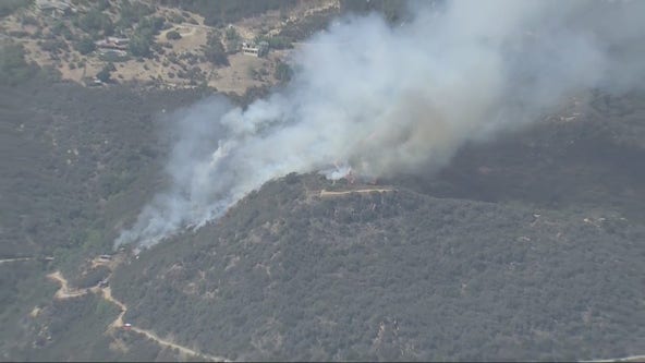 Crews battling 2-alarm brush fire in Topanga