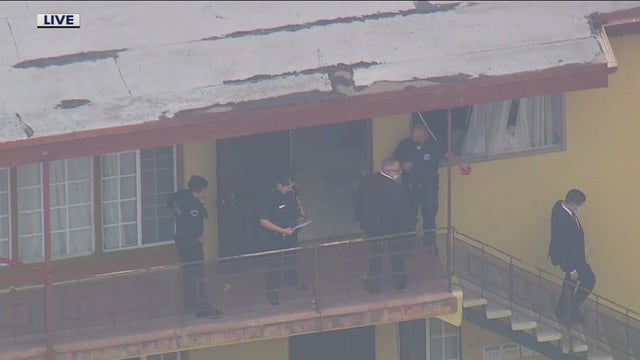 LAPD officers fatally shoot suspect holding elderly woman at knifepoint inside West LA apartment