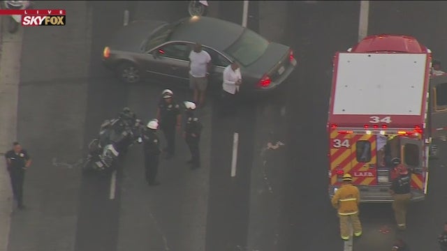 Motorcycle officer injured in West Adams crash
