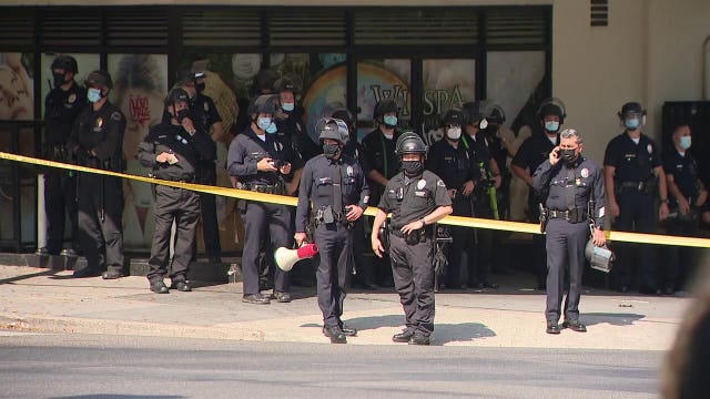 Unlawful assembly declared outside Koreatown spa, several dozen arrested