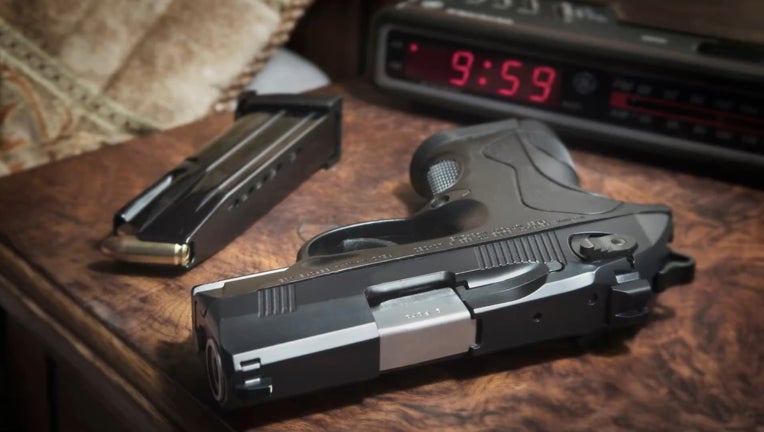 UntitledBerreta 9mm PX4 Storm semi-automatic pistol on bedside nightstand