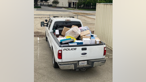 Over $100,000 in stolen property recovered from homeless encampment; suspect search underway