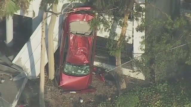 Car falls off parking garage in Downtown Los Angeles