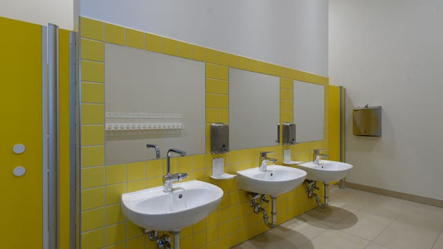 High school coach arrested for allegedly placing hidden camera in girls bathroom