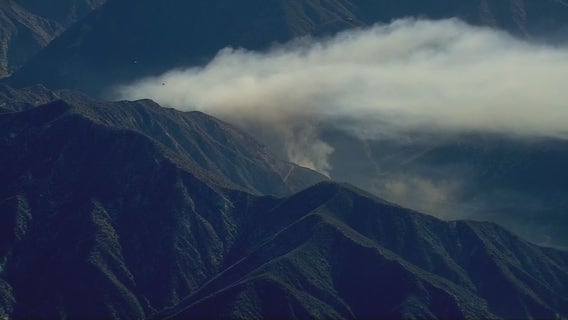 Person detained after small brush fire ignites north of Azusa