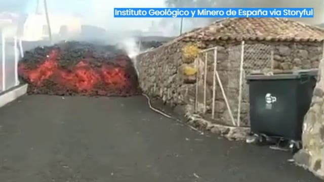 Video: Lava oozes down streets, ignites homes in Spain after volcano eruption