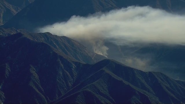 Person detained after small brush fire ignites north of Azusa