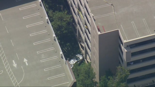One dead after car plunges off parking structure in Orange