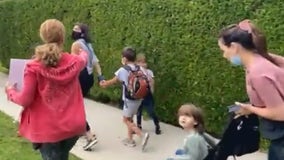 Anti-vaccine protesters confront parents walking kids to school in Beverly Hills