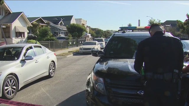 Police: Woman shot by LAPD officer while attacking her son with knife