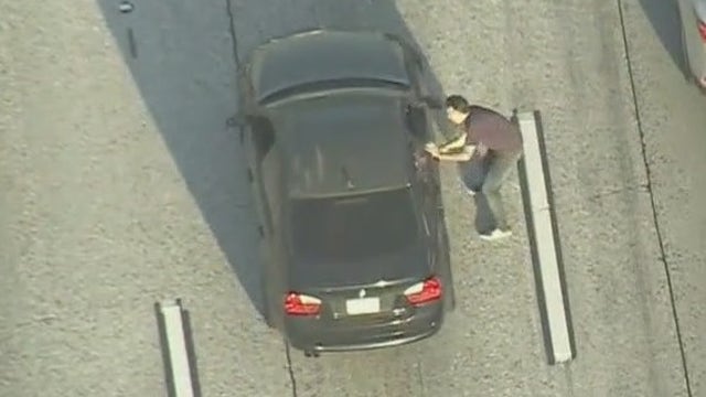 Suspect walks on freeway, carjacks BMW, leads deputies on chase, hides in hotel
