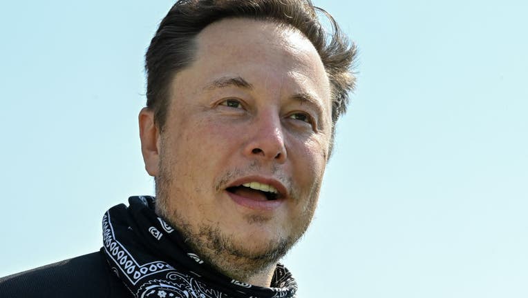 FILE - Elon Musk, Tesla CEO, stands at a press event on the grounds of the Tesla Gigafactory on Aug. 13, 2021, in Brandenburg, Germany. (Photo by Patrick Pleul/picture alliance via Getty Images)