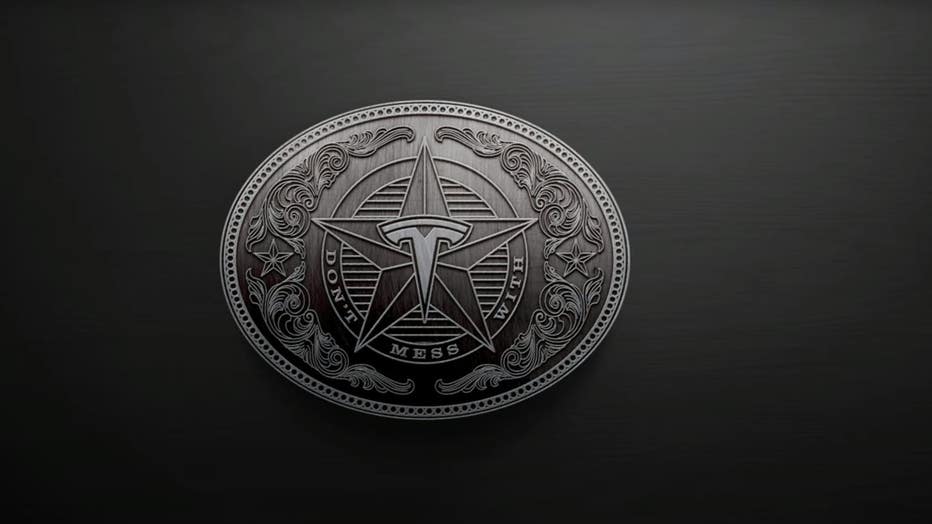 34841f12-TESLA-HQ-IN-AUSTIN-LOGO.jpg