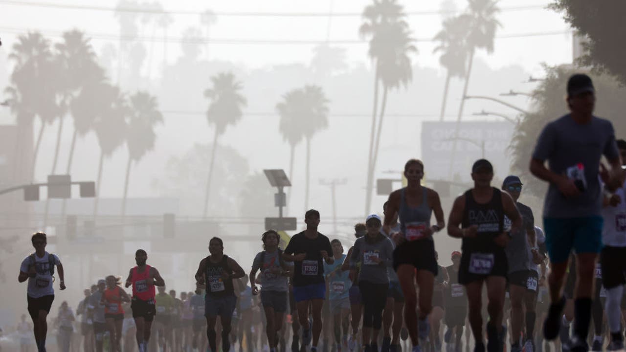 john korir natasha cockram win la marathon