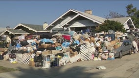 Koreatown hoarder: LA City crews working to clean up piles of junk outside home