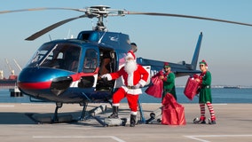 Santa trades in sleigh, flies helicopter full of toys to Catalina Island for kids in need