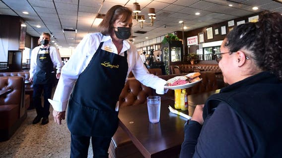 Vaccinated California employees face workplace restrictions