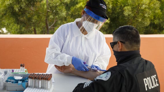 Judge tosses LAPD officers' suit over COVID-19 vaccine requirement