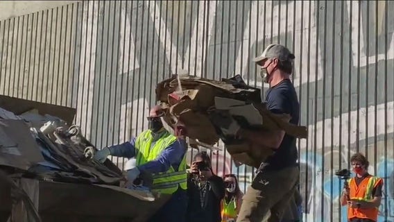 Gov. Newsom visits littered LA rail site, vows cleanup and more enforcement