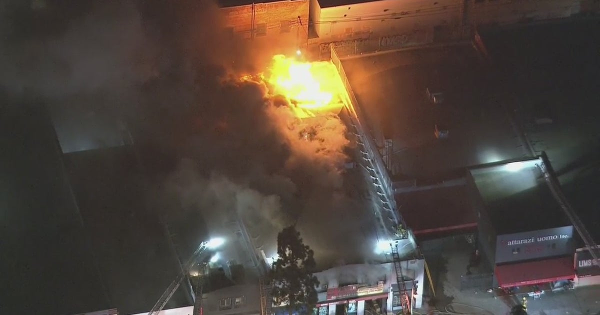 More than 150 firefighters respond to large fire in downtown LA, no one ...
