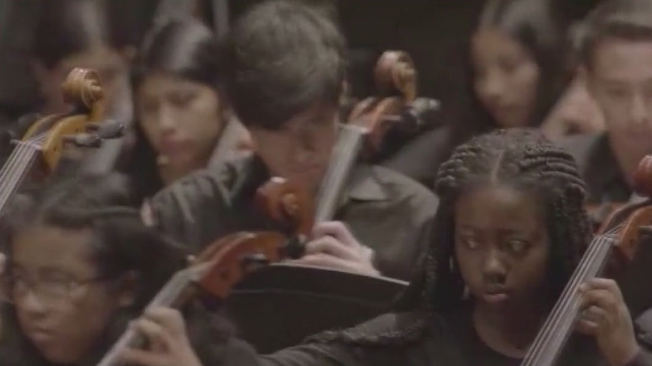 Los Angeles Youth Orchestra musicians perform with masks on outside Super  Bowl