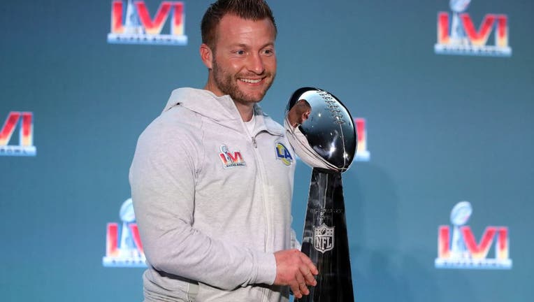 Head coach Sean McVay of the Los Angeles Rams poses with the Vince Lombardi Trophy during the Super Bowl LVI head coach and MVP press conference at Los Angeles Convention Center on February 14, 2022 in Los Angeles, California.
