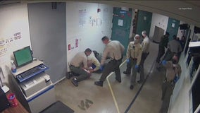 LA sheriff's deputy knelt on head of handcuffed inmate, according to report