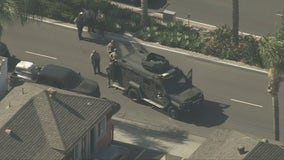 2 Armed suspects barricaded in Commerce building taken into custody