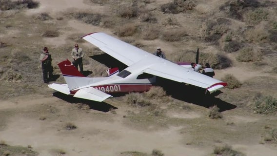 Plane crashes through fence, into dirt at Lancaster airport