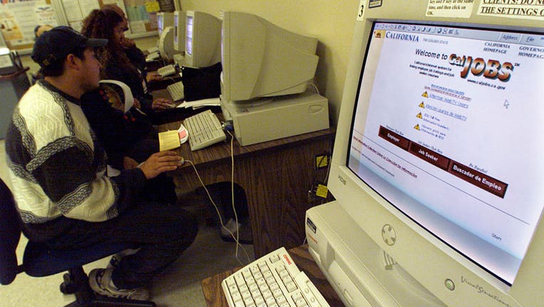 Job and benefits seekers in the EDD office using the computer terminals to seek jobs and benefits in