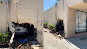 Collision causes vehicle to crash into OC building