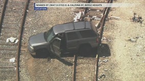 VIDEO: Suspect in custody after hours-long standoff, bizarre pursuit through Boyle Heights rail yard