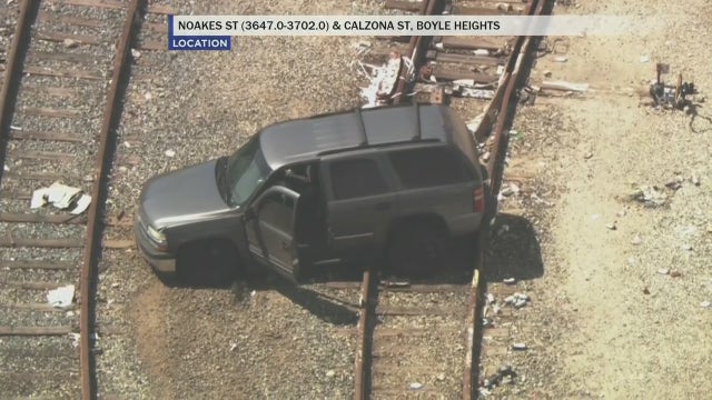 VIDEO: Suspect in custody after hours-long standoff, bizarre pursuit through Boyle Heights rail yard
