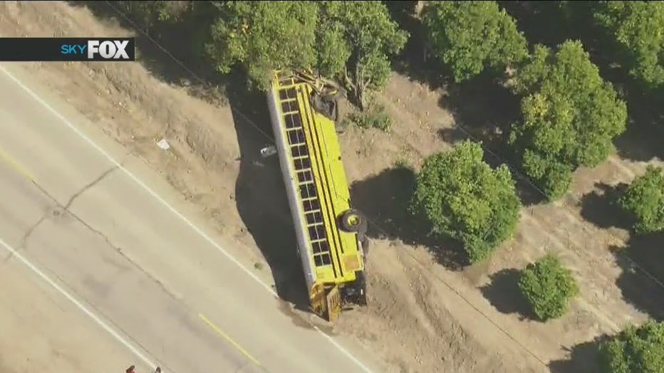 A school bus carrying nearly a dozen student athletes overturned in Ventura County.