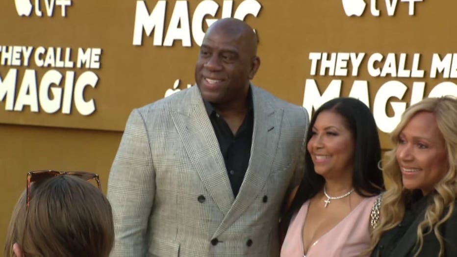 Magic Johnson celebrates the premiere of "They Call Me Magic" at a red carpet event in Westwood.