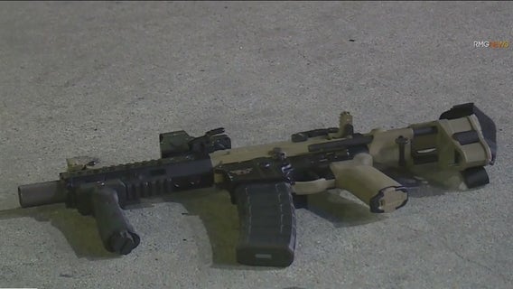 Man found shot to death with rifle next to body near downtown LA gas station