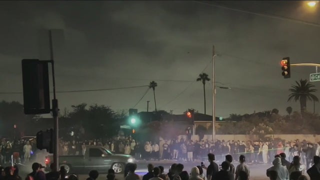 Video: Compton street takeover draws hundreds