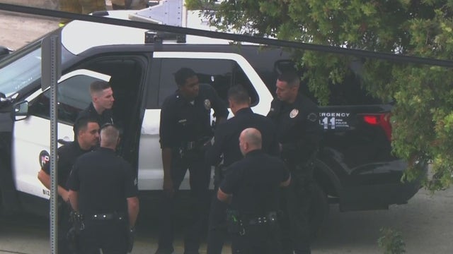 LAPD officer responding to fight in South LA street injured