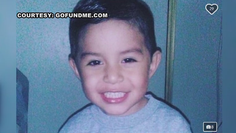 Photo of 4-year-old Noah Cuatro. Noah has brown hair and brown eyes, with a smile on his face.